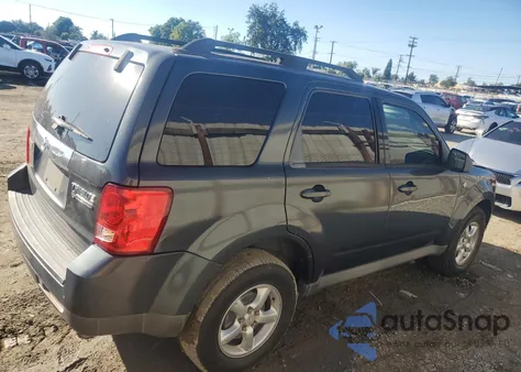 2009 Mazda Tribute Hybrid z USA, uszkodzony, nr VIN 4F2CZ49319KM07138